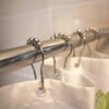 Set x12 ganchos para cortina de baño con bolitas de acero